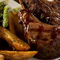 Lamb Chops · New Zealand double cut, grilled asparagus, roasted fingerling potatoes.