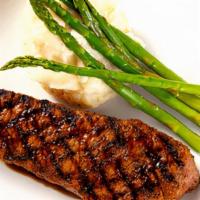 New York Strip · 14 oz. Aged, grilled asparagus, mashed potatoes.