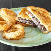 Patti Melt · Hamburger served on grilled rye bread with grilled onions and swiss cheese.