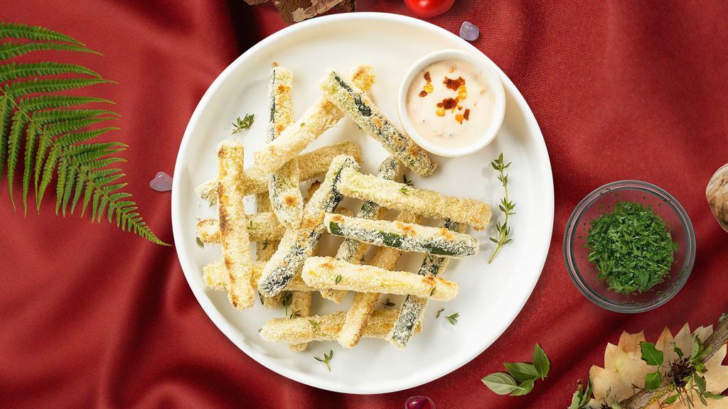 Zucchini Zest Sticks · Sliced zucchini breaded and fried until golden brown. Served with your choice of sauce.