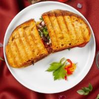 Terrific Turkey Avocado Panini · Swiss cheese and mayo on toasted ciabatta bread. Served with french fries.