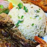 Caliente Dinner Combo · Steak, pork and shrimp. Served with Mexican rice or cilantro rice, refried beans or black be...