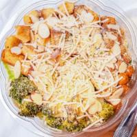 Super Caesar (Gf, Sf) · Quinoa, greens, garlic roasted broccoli, paprika chickpeas, croutons, sliced almonds, breadc...
