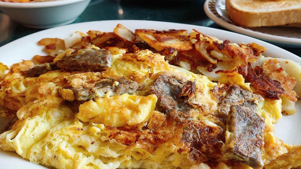 Hercules Omelette · With sliced gyro and feta cheese.