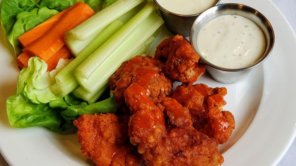 Boneless Chicken Wings · Choice of wing sauce - buffalo, bbq, spicy thai or lemon pepper dry rub. Veggie sticks. Ranch or blue cheese dipping sauce.