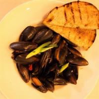 Steamer Mussels · One pound, served in broth - garlic, lemon, butter, wine, scallions & crostini