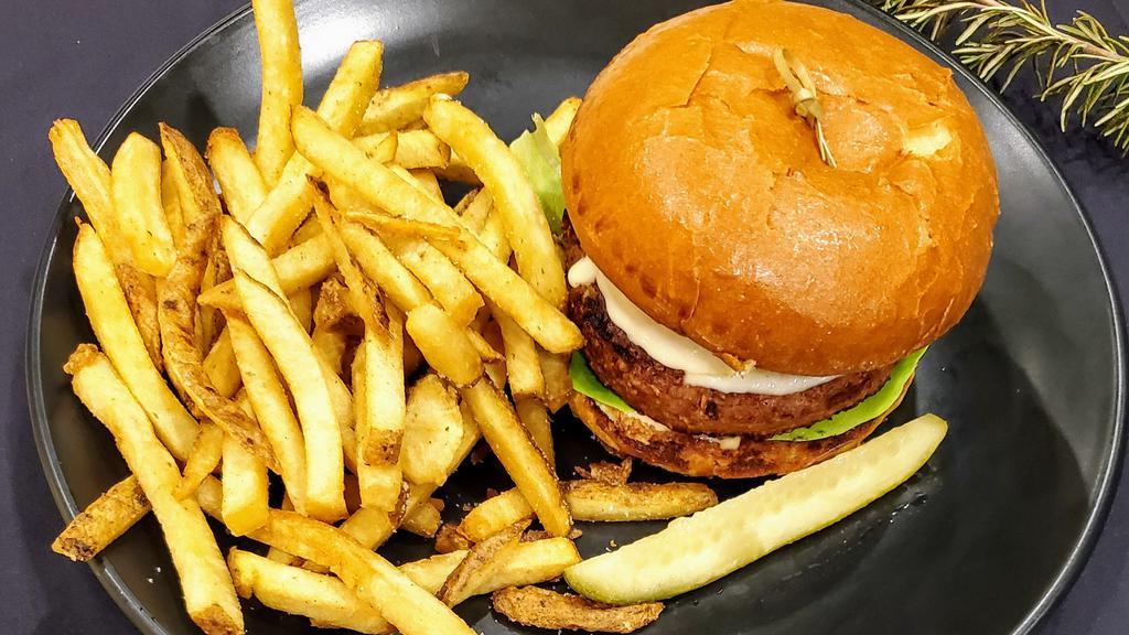 Beyond Burger · Kosher plant-based patty containing no GMOs, soy or gluten. Brioche bun, lettuce, tomato, onion, beer-battered onion ring, provolone & burger sauce. Choice of side item.