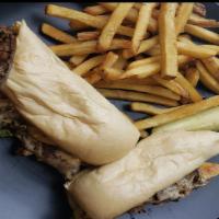 Philly Cheese Steak · Spice rub angus beef, sautéed onions & peppers, provolone cheese, horseradish aioli & toaste...
