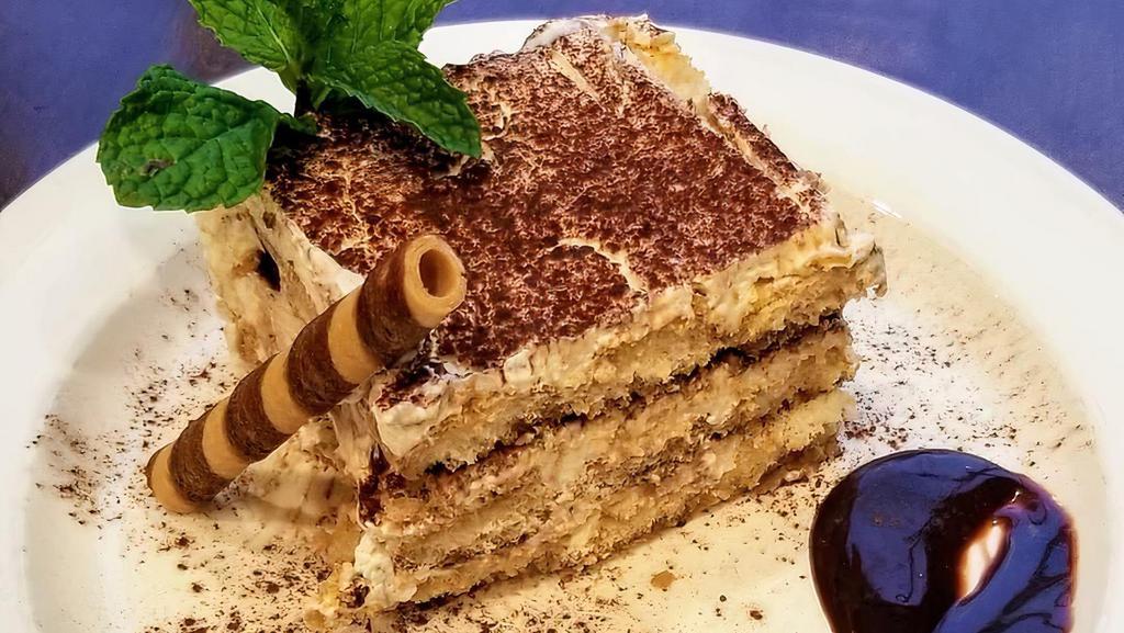 Tiramisu · layered with espresso cream, mascarpone, ladyfingers, chocolate & vanilla whip