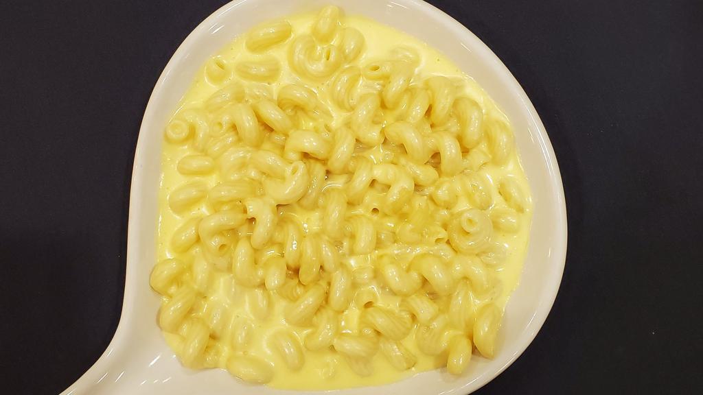 Kids Mac & Cheese · Cavatappi noodles and creamy cheddar cheese sauce