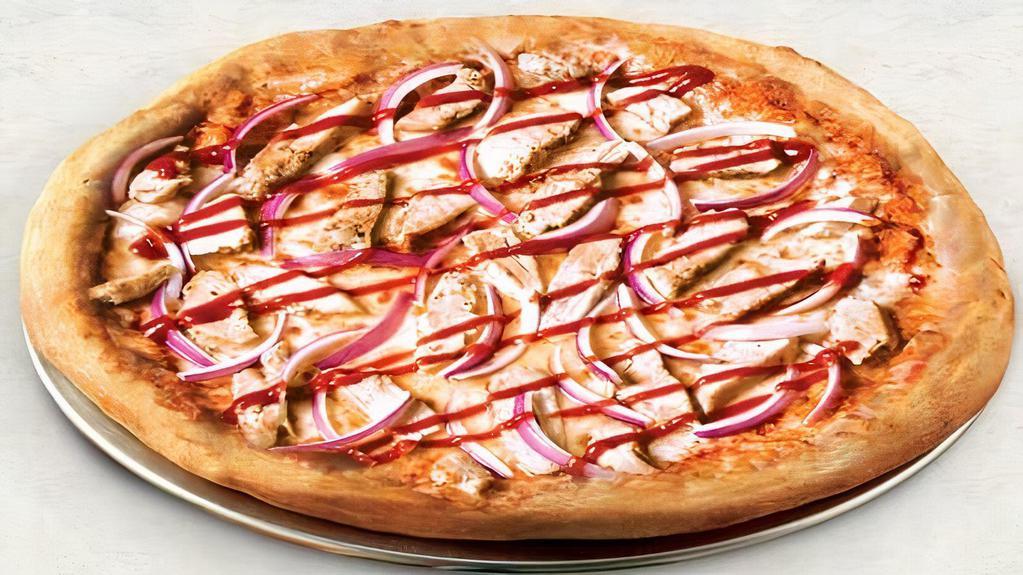 Bbq Chicken Pizza · Special BBQ sauce loaded with grilled marinated chicken breast, fresh red onions, and topped with an extra amount of special blend of 100% fresh natural cheeses. Served with garlic butter sauce.