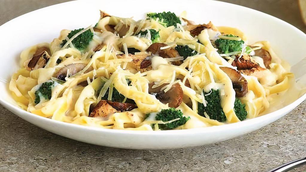 Chicken Fettuccine Alfredo · Grilled marinated chicken breast, Sautéed broccoli and mushrooms in our creamy Alfredo sauce, served over fettuccine, topped with shredded Parmesan cheese.