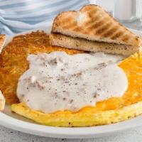 Meat Lover'S Omelet · Diced ham, crumbled bacon, sausage and cheese topped with sausage gravy.