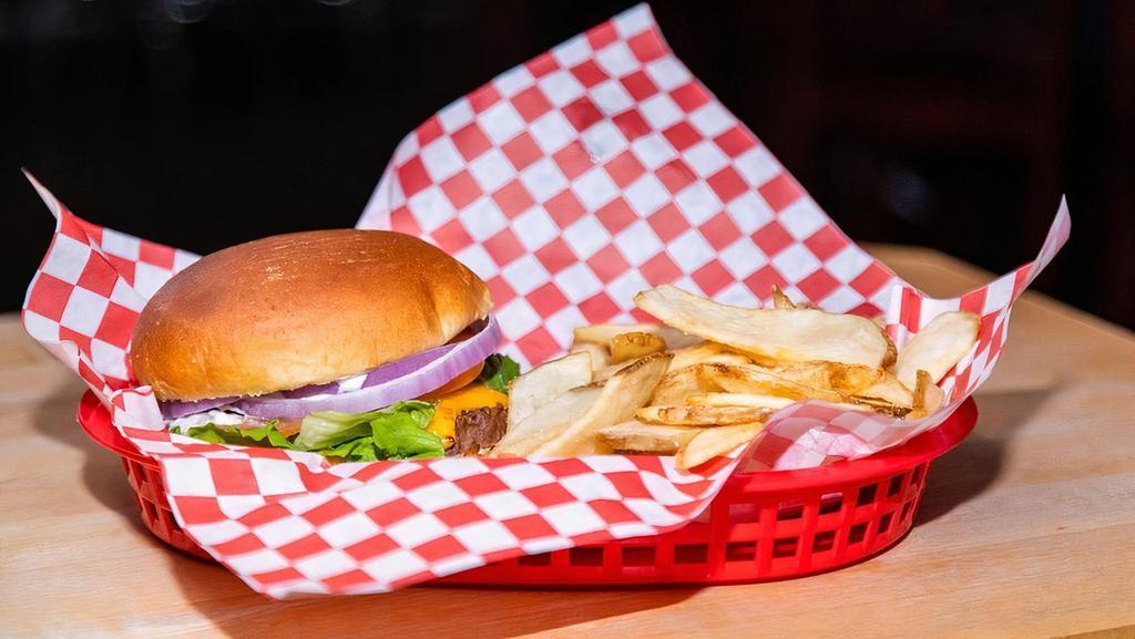 The Den Pub Burger · Cheese, lettuce, tomato, pickles, onions, mayo.