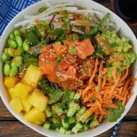 Mango Salmon Bowl · Your choice of white rice or mixed greens topped with Fresh Salmon, Mango, Cucumber, Daikon ...