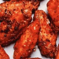 Traditional Wing Bucket · 24 Traditional Wings tossed in up to 2 of your favorite sauces. Served with ranch or blue ch...