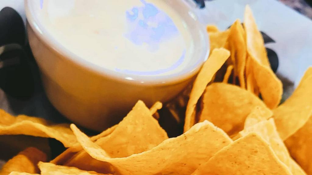 Chips & Queso · Add Salsa for an additional charge.