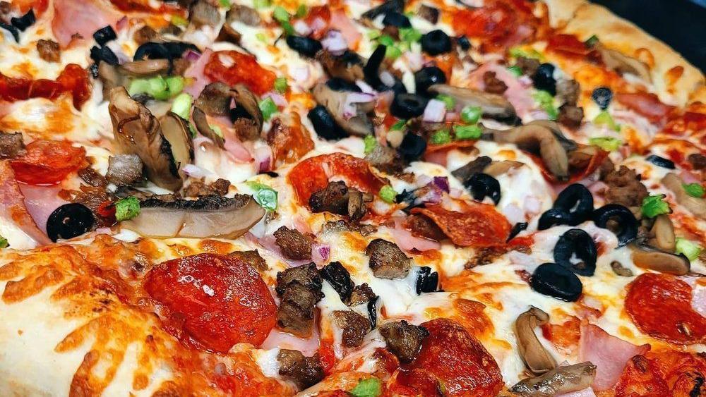 Ultimate Pizza · Pepperoni, sausage, canadian bacon, beef, bacon, onion, green peppers, mushrooms and black olives.