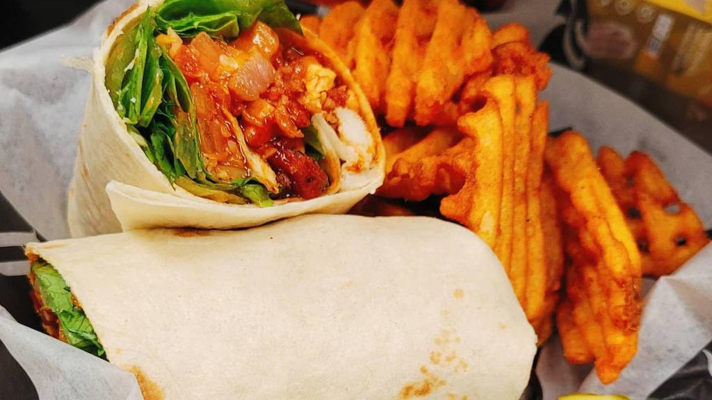 Bbq Chicken Wrap · Chicken grilled or cripsy smothered BBQ lettuce, tomato, bacon and cheddar jack cheese.