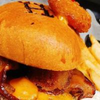 Hot Hickory Western · Hot Hickory Gold sauce, bacon, cheddar cheese and
a hand battered onion ring.