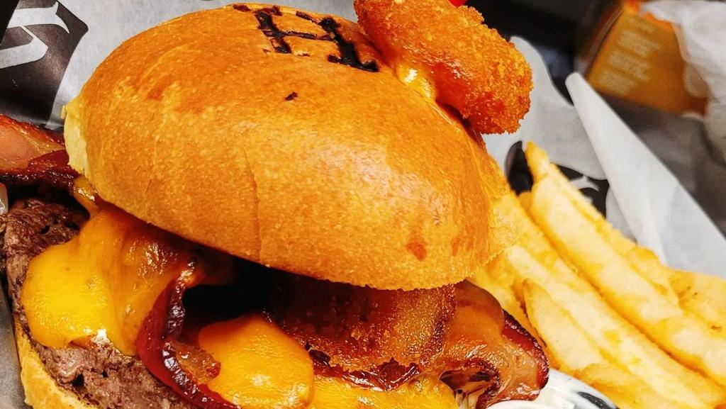 Hot Hickory Western · Hot Hickory Gold sauce, bacon, cheddar cheese and
a hand battered onion ring.