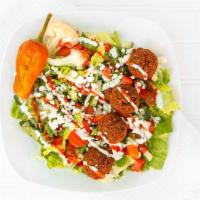 Falafel Salad · 11. Vegetarian. Fried veggie balls. Served with lettuce, tomatoes, onions, cucumbers, pickle...