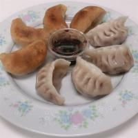 Fried Or Steamed Dumpling (8) · Eight pieces per order.