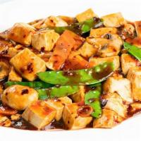 Sautéed Bean Curd Hunan Style · Soft bean curd, mix vegetables (bamboo, carrots, snow peas), brown spicy sauce.