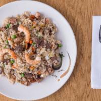 House Fried Rice · Chicken, beef, shrimp, peas, carrots and egg.