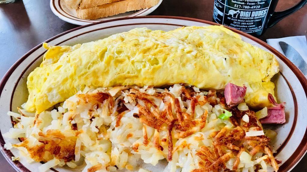 Universal Omelette (Best Seller) · Ham, bacon, sausage, green peppers and onions. Swiss and American Cheese.