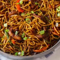 Chicken Chow Mein · Pan fried chow mein noodles mixed with chicken and fresh vegetables.