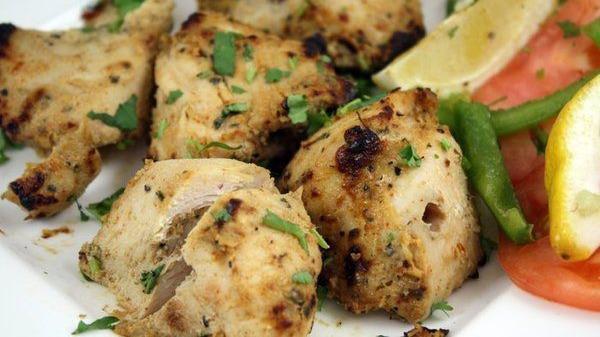Malai Kabab · Tender pieces of chicken breast marinated in cashew nuts and cream cheese paste.