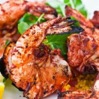 Tandoori Prawn · Fresh jumbo shrimp marinated with mild spices and roasted in a clay oven.