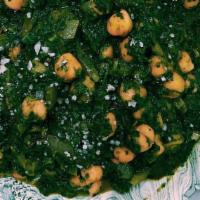 Chana Saag · Chickpeas and spinach cooked with onions, garlic and spices.