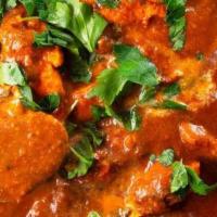 Chicken Tikka Masala · Tender boneless pieces of marinated chicken cooked in tandoor and finished in rich tomato-ba...