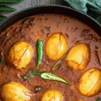 Egg Curry · Steamed cage free eggs simmered into tomato and onion based sauce with a blend of aromatic a...