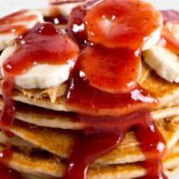 Pb&J Pancake · Non-GMO whole grain whey protein pancakes topped with peanut butter, banana and sugar-free j...