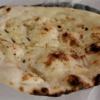 Garlic Naan · White unleavened bread with a garlic touch.