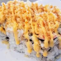 Crunchy California Roll · Crab, avocado, cucumber topped with crunch, spicy mayo and unagi sauce.