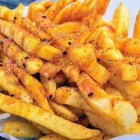 Spicy Fries · Potato Fries topped with Togarashi (Japanese Spice), sesame seeds, salt and drizzled with Ka...
