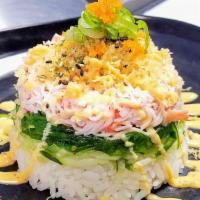 Sushi Tower · Your choice of Avocado Smash, Crab Salad, Salmon or Spicy Tuna layered with Seaweed, Cucumbe...