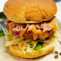 Krabby Burger · Fried Krabby patty, lettuce, avocado smash, cole slaw, drizzled with spicy mayo on lightly t...
