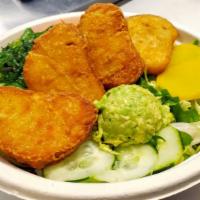 Fried Tofu Bowl · Four pieces of fried tofu nuggets, oshinko radish, and seaweed salad. Served with rice, lett...