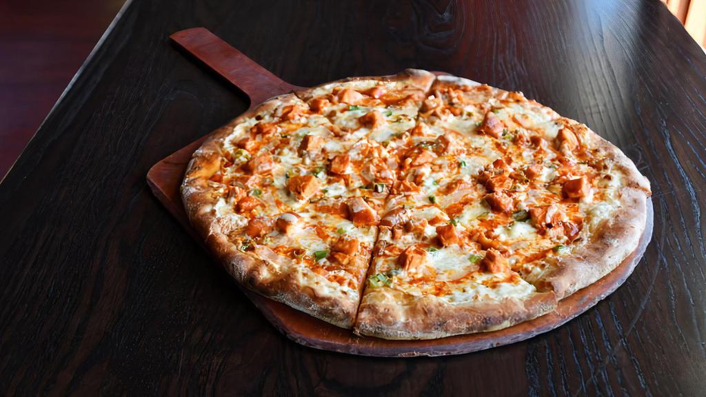 Buffalo Chicken · Olive oil, oven roasted buffalo chicken and scallions with a ranch and buffalo swirl.