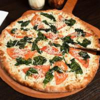Bianco Speciale · Our white pizza with sprinkled parmesan over sliced fresh tomatoes, sautéed spinach and oreg...