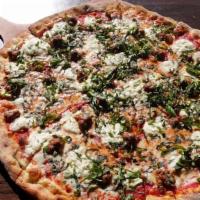 Lasagna Pizza · Classic sauce, crumbled meatball, infused ricotta and chopped basil
