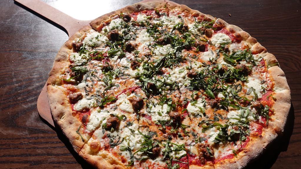 Lasagna Pizza · Classic sauce, crumbled meatball, infused ricotta and chopped basil
