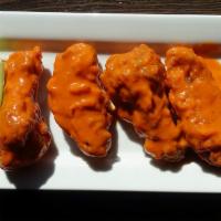Buffalo Wings · Six jumbo wings, tempura battered and fried, served with bleu cheese
