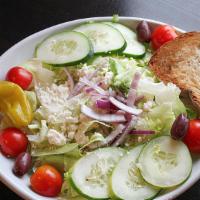 Greek Salad · Red onions, cucumbers, iceberg lettuce, kalamata olives, cherry tomatoes, and feta cheese wi...
