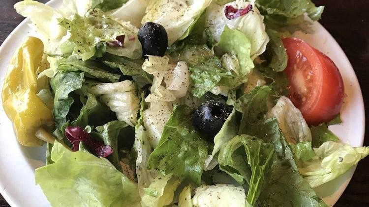 Side Salad  · Side servings of Caesar or house salad